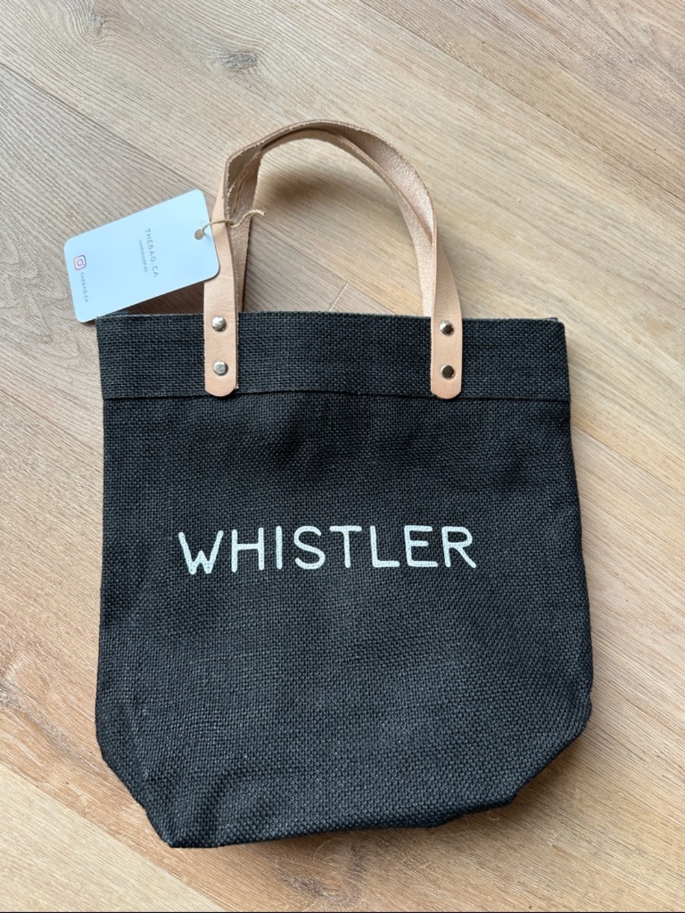 Whistler Black Tote Bag with tan leather handle